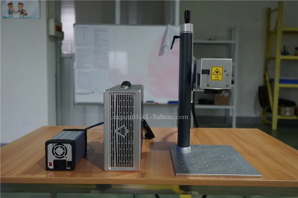 Cnc гравировальные машины Закрытая лазерная маркировочная машина волоконная |