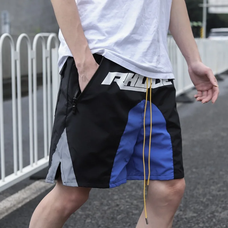 

2021 New Summer Reflective Strip Stitching Fashion Printing Shorts Mens Mesh Pocket Drawstring Leisure Loose Sports Pants Daily