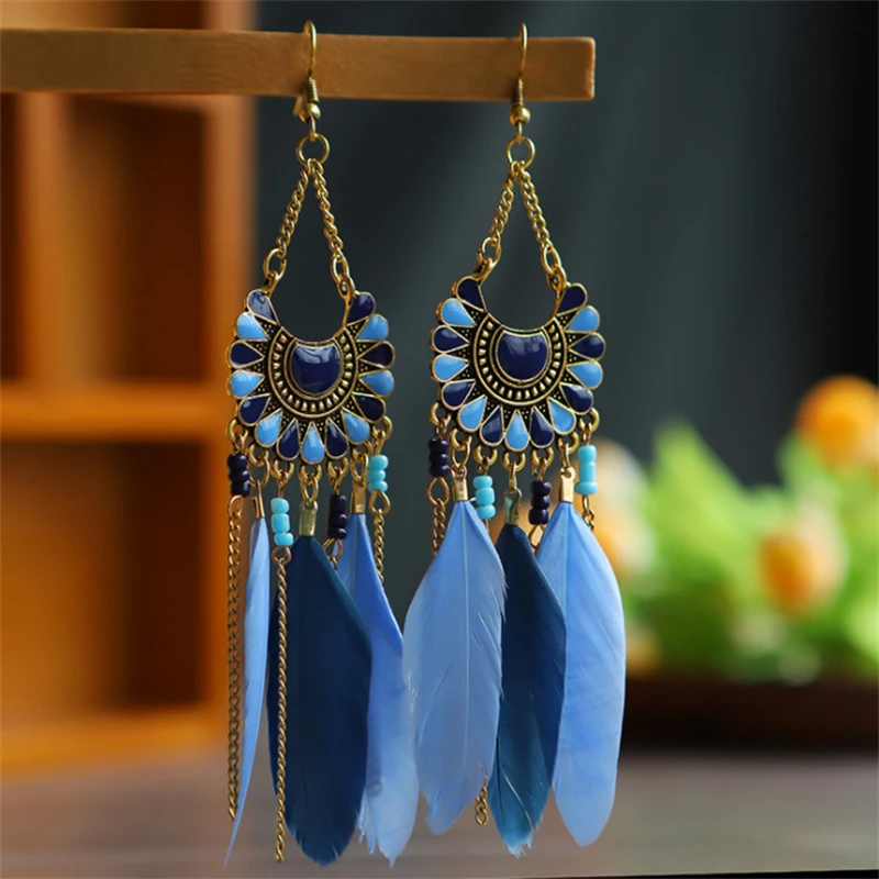 

Exaggerated Tassel Feather Earrings Female Personality Fan-Shaped Long Rice Bead Earrings Retro Dripping Earrings