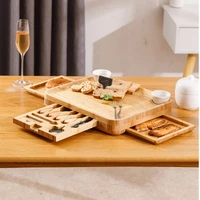 three pump cheeseboard set bamboo board set contains four knives and two slabs of rock and chalk