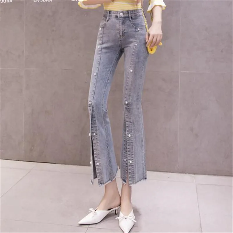 

2020 New Spring Autumn Front Split Beaded Jeans Female Jeans OL Style Big Pearl Nine Points Denim Micro Flared Pants Raw Edges