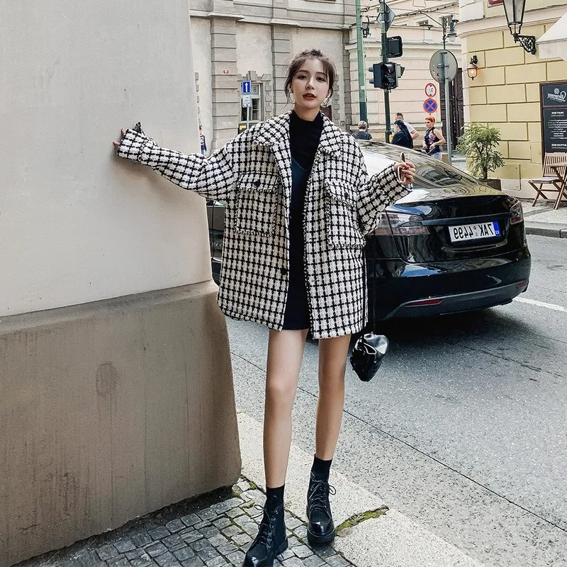 

In autumn and winter, the long section is thin, British style, slim and loose Korean style black and white grid children