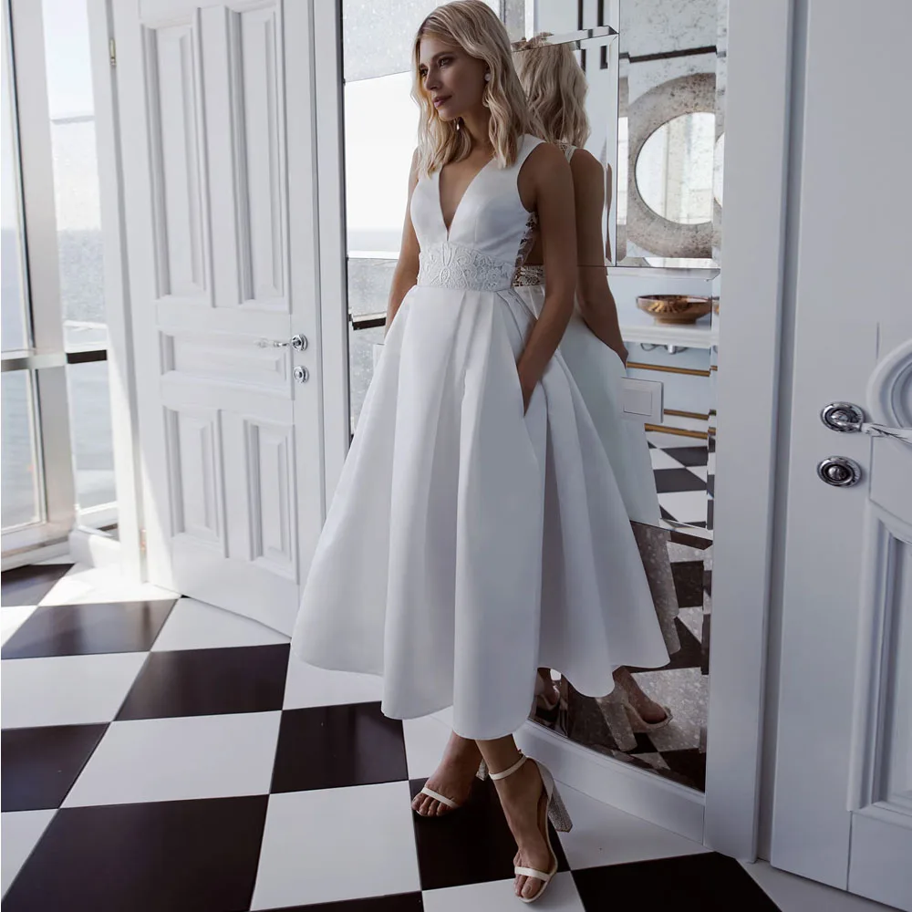 

UETEEY A-Line Tea Length Wedding Dress A Line Sleeveless Backless Lace Appliques Pleat V-Neck Sweep Train 2021 Wedding Gowns
