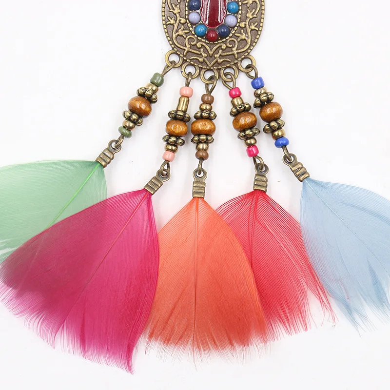 

European and American New Fashion Retro Bohemian Style Hand-made Rice Bead Long Feather Tassel Earrings