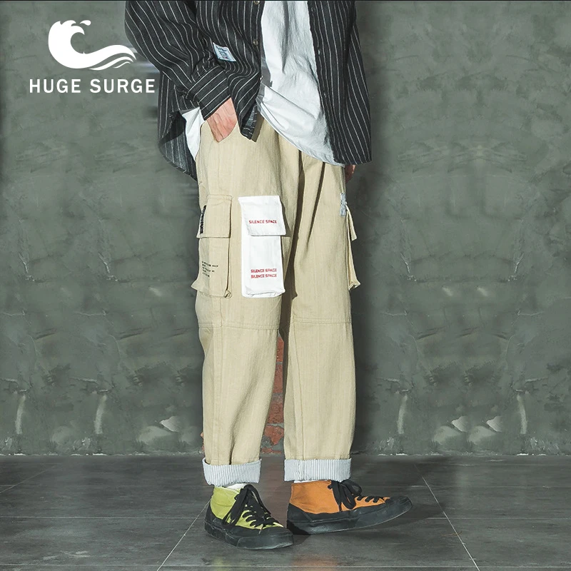 

HUGE SURGE Hip Hop Loose Cargo Pants Street Fashion BF Sports Pants With Multiple Pockets And Cotton Trousers Cuffed Joggers