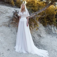 sweetheart neckline lace and tulle champagne wedding dress illusion back with button and wraps bohemian bridal dress