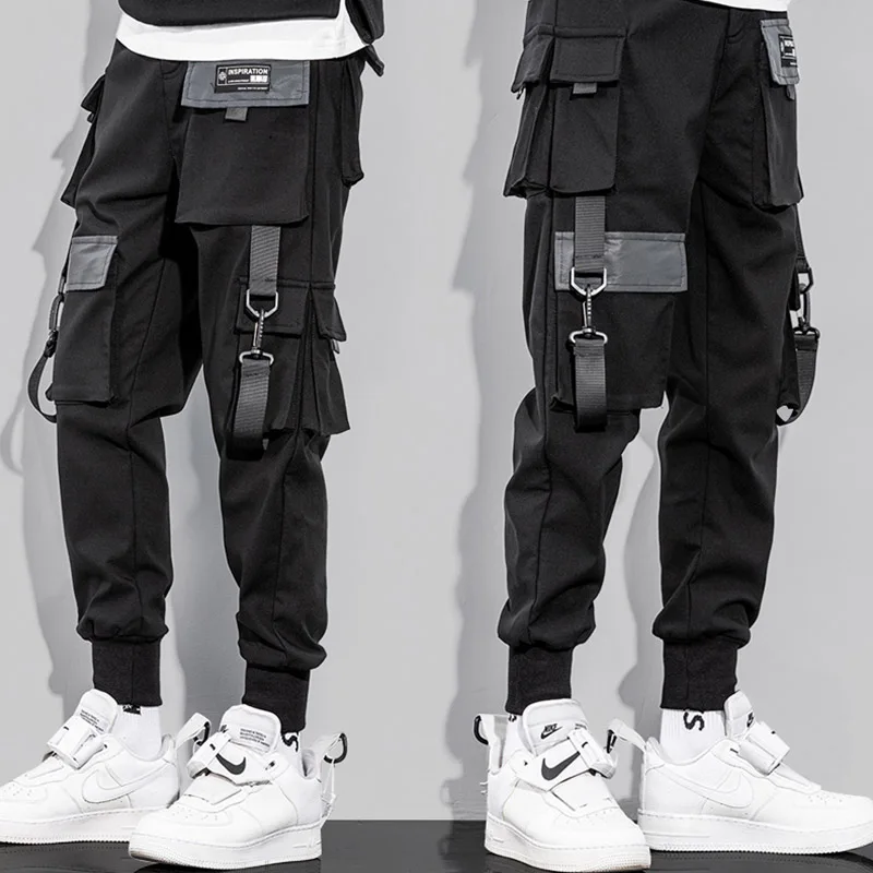 

Модные повседневные мужские брюки Techwear, Блестящие Брюки с карманами и лентами, повседневные мешковатые тактические штаны, уникальный дизай...