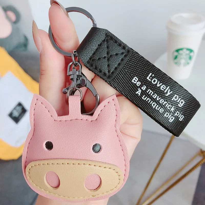 

Cute personality pig keyrings Leather car keychains for men and women Car lock key chain