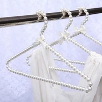10pcs pearl hanger fashion hangers for clothes home closet space saver clothes dress storage rack pearl hanger new fashion