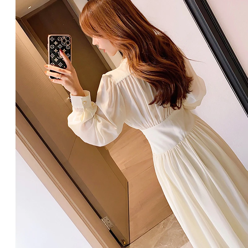 

VICONE Autumn new style bubble sleeve V-neck waist slim pearl yarn dress