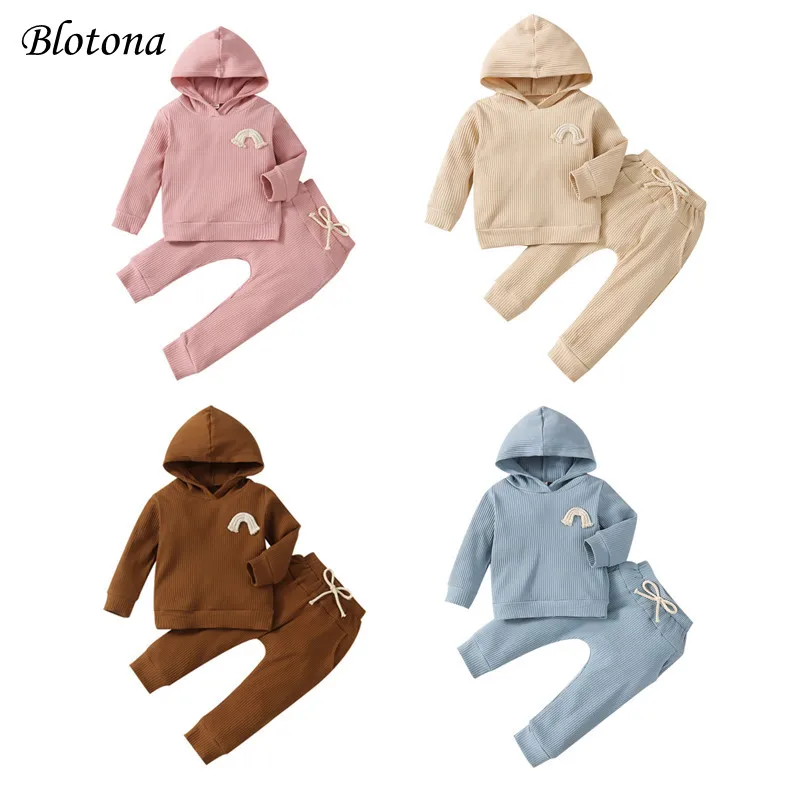 

Blotona 2Pcs Toddler Ribbed Outfits, Kids Rainbow Decoration Long Sleeve Hooded Sweatshirt + Trousers with Pockets 1-6Years