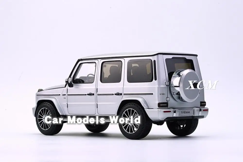 Литая модель автомобиля для мини хампс G Class (W 463) (серебро) 1:18 + маленький подарок!| |
