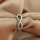 Женское кольцо с кристаллами и цирконом, в виде сердца