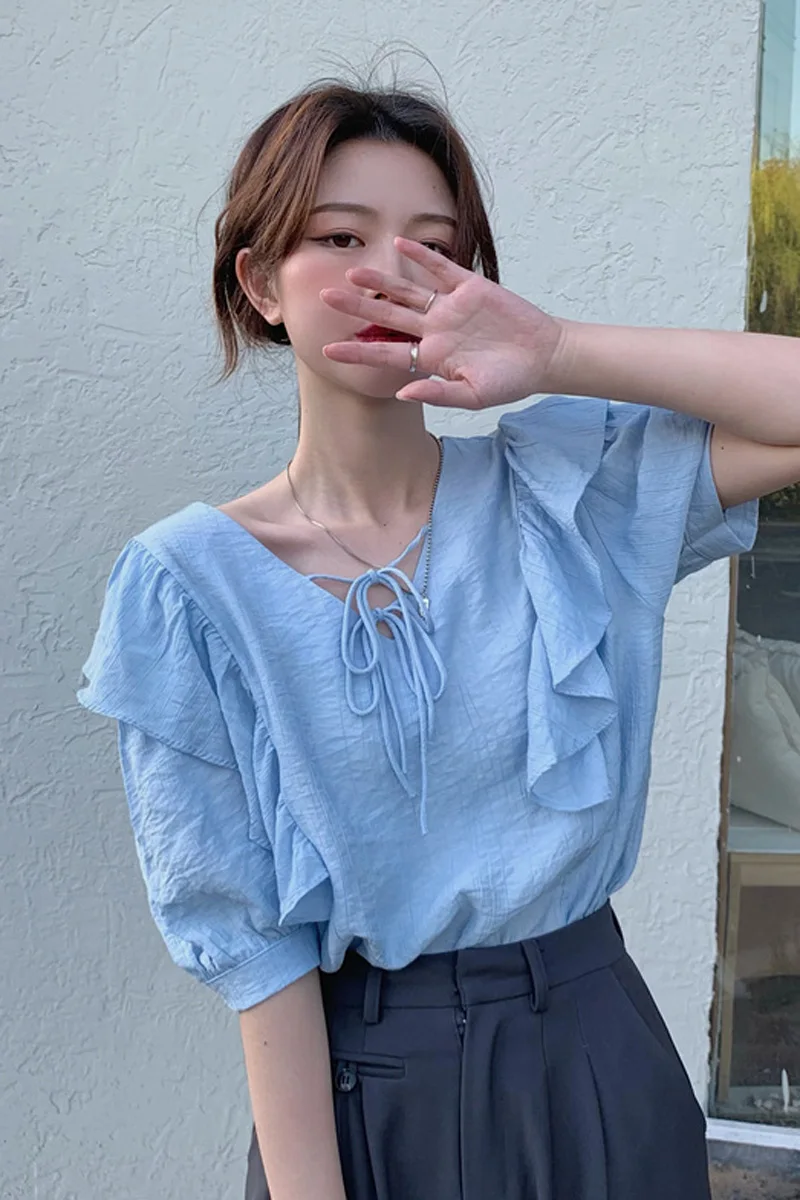 

Light blue shirt 2021 summer new style Korean version of V-neck lace ruffled design niche short-sleeved top