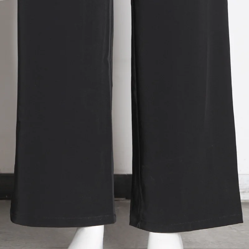 Женский комбинезон на бретелях с широкими штанинами разноцветный бантом