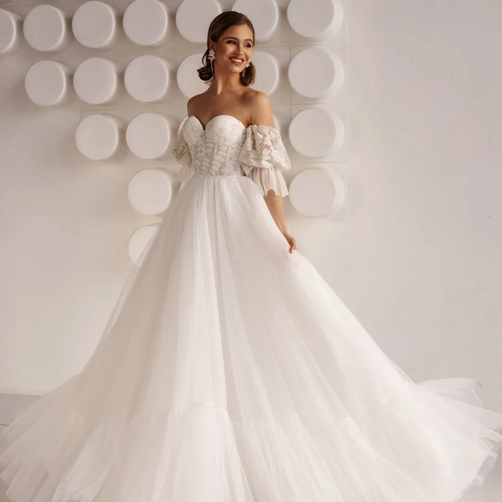 

Wedding Dresses 2021 New Sweetheart Sleeveless Backless Appliques Bridal Gowns Sweep Train Tulle Long Vestidos De Novia