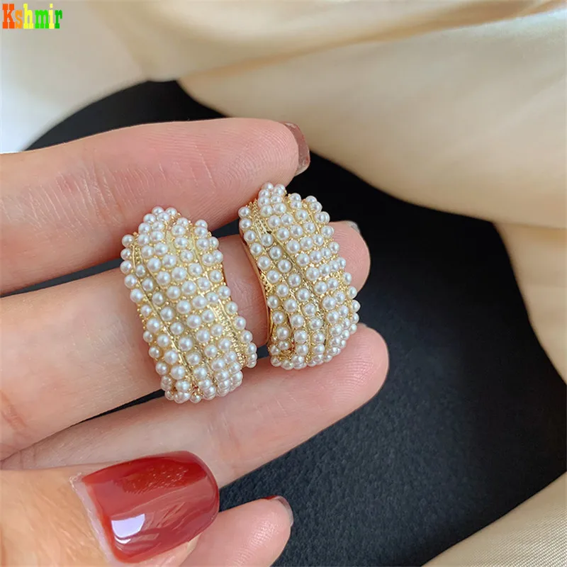 

Kshmir Temperament arc metal pearl earring female 2021 new trend contracted earring is female jewelry gift