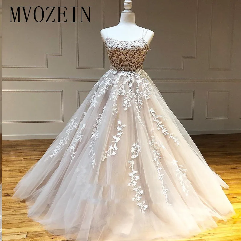 

Champagne Evening Dresses 2019 Ball Gown Spaghetti Strap Lace Appliques Backless Long Evening Dress Vestidos de festa Longo