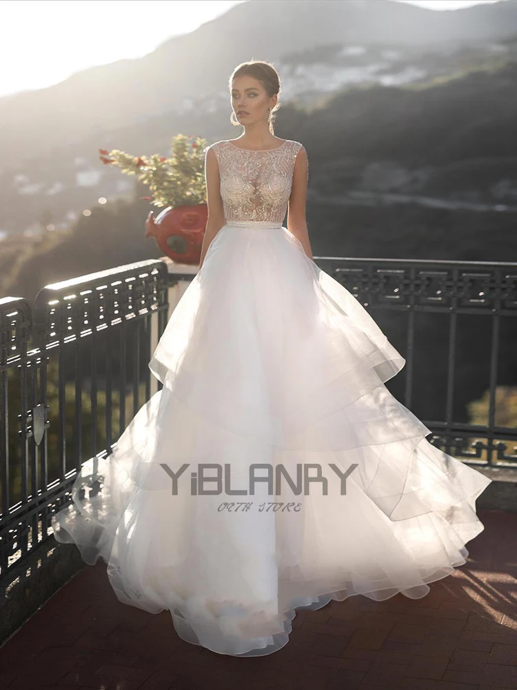 

YILIBER Lace wedding dress o-neck sleeveless retro bridal dresses sequins luxury fluffy skirt lace big skirt