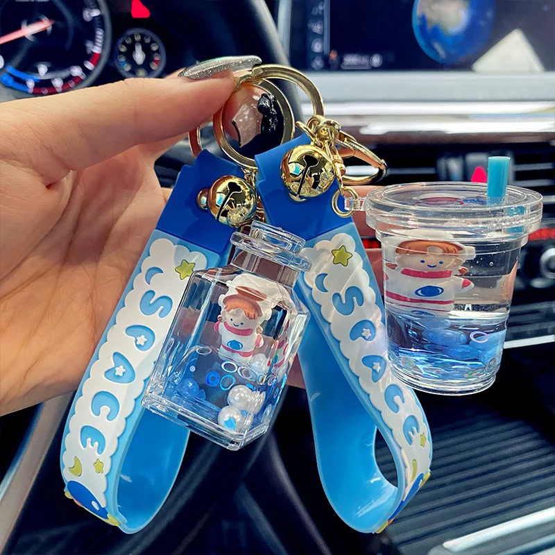 

Creative Into The Oil Astronaut Keychain Cartoon Acrylic Liquid Floating Planet Space Astronaut Car Keyring Bag Pendant Jewelry