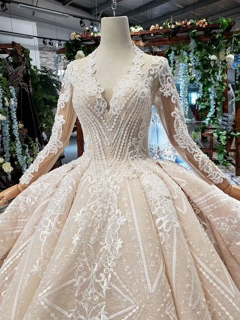 BacklakeGirls 2020 New Deep V Neck Organza Ball Gown Appliqued Beaded Sequins Muslim Wedding Dresses Long Sleeve Hollow Out Back |