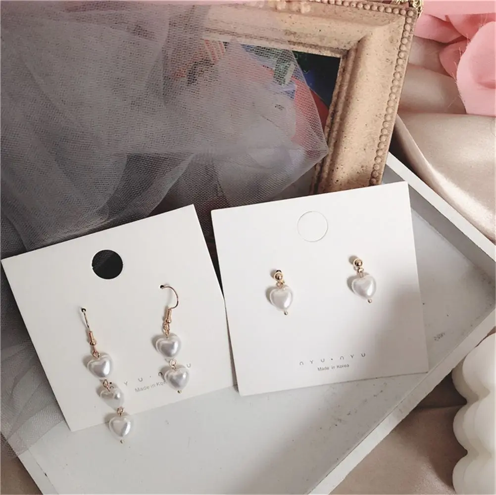 Асимметричные серьги-гвоздики с жемчугом |