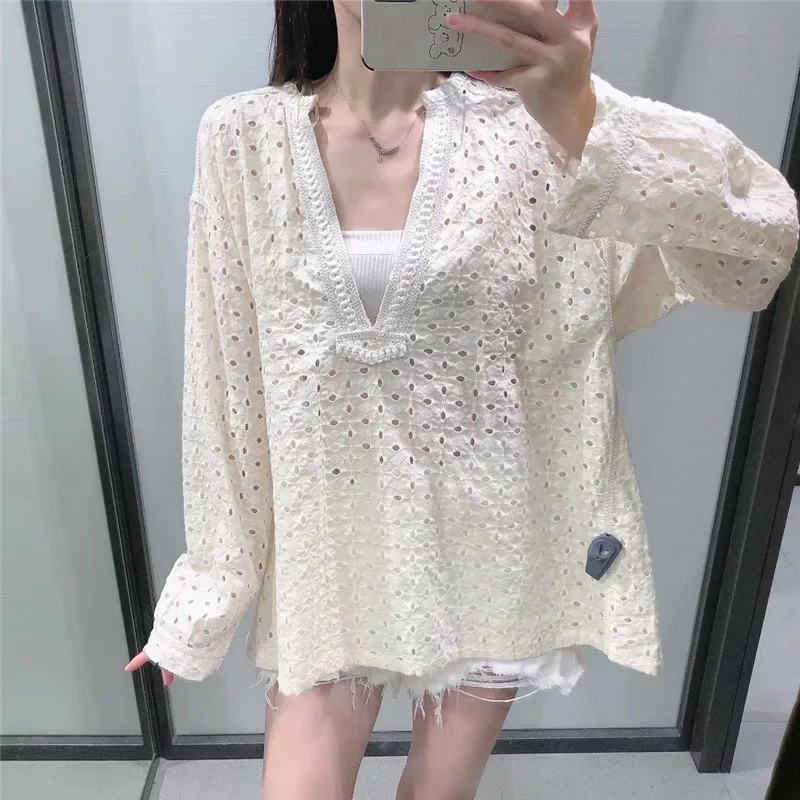 

Za 2021 Summer Openwork Embroidered Blouse Women Long Sleeve V Neck Vintage Blouses Female Fashion Irregular Hem Casual Top