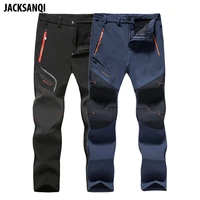 jacksanqi men winter fleece waterproof outdoor hiking pants softshell camping trekking climbing training male trousers 6xl ra327