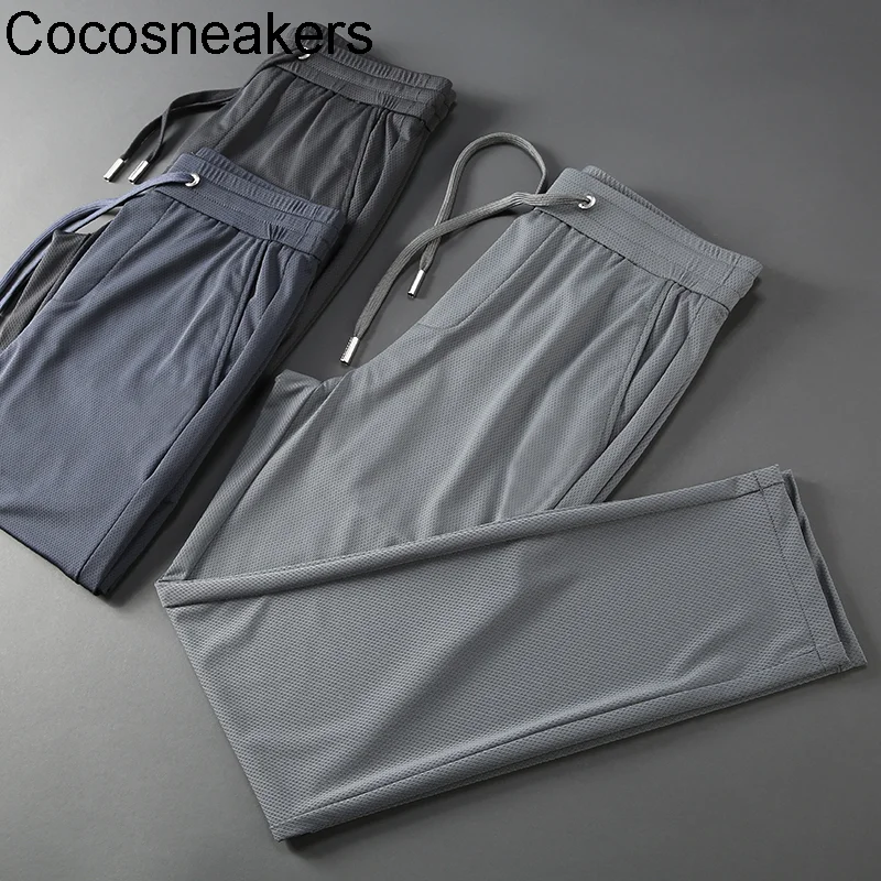 

New Jsbd high quality ultra-thin silk slip men's pants ice silk hollow mesh fabric summer men's quick drying sports casual pants