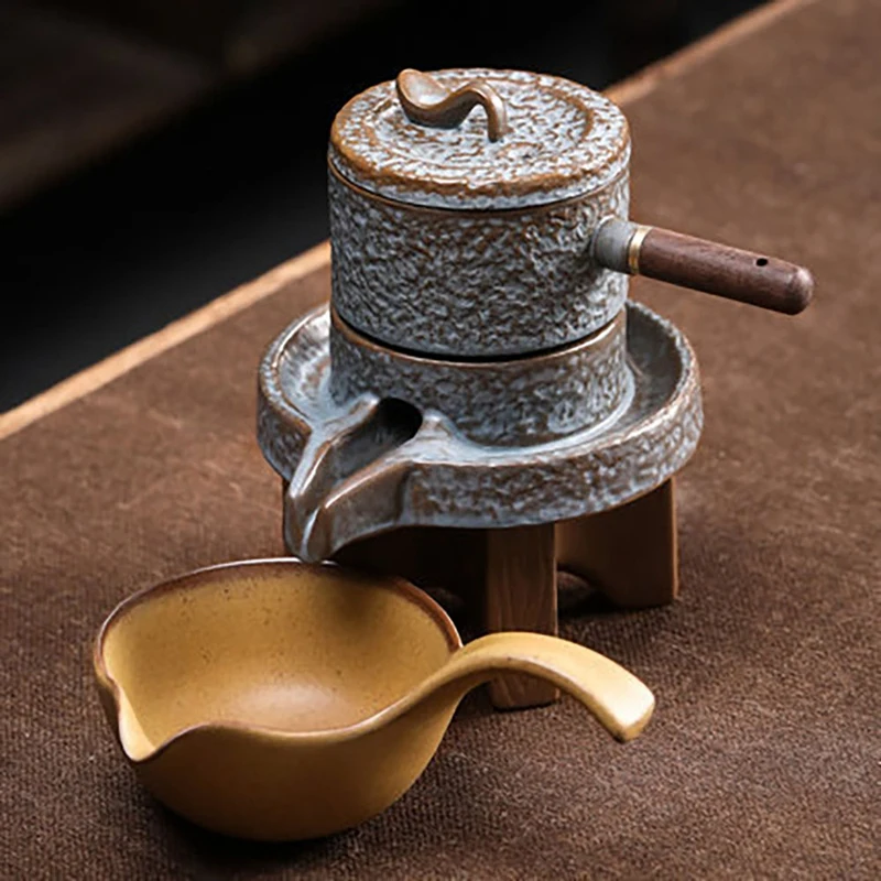 

Creative Pottery Lazy Stone Grinding Tea Set Rotating Water Teapot Anti Scalding Design Rotating Teapot for Tea Ceremony