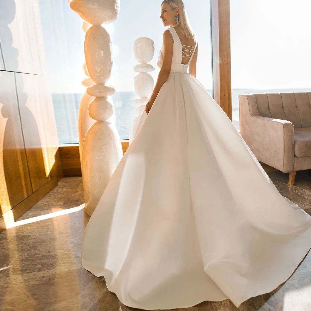 

Vestidos Charming Wedding Dresses Satin Pleat Bows Sashes V-Neck Sleeveless Backless A-Line Bridal Gowns