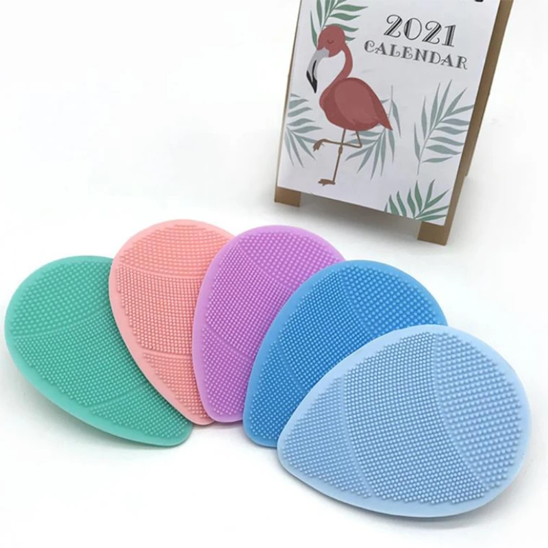 

Silicone Water Drop Shape Face Scrubber Manual Facial Deep Cleansing Pad with Suction Handle Blackhead Removing Exfoliating