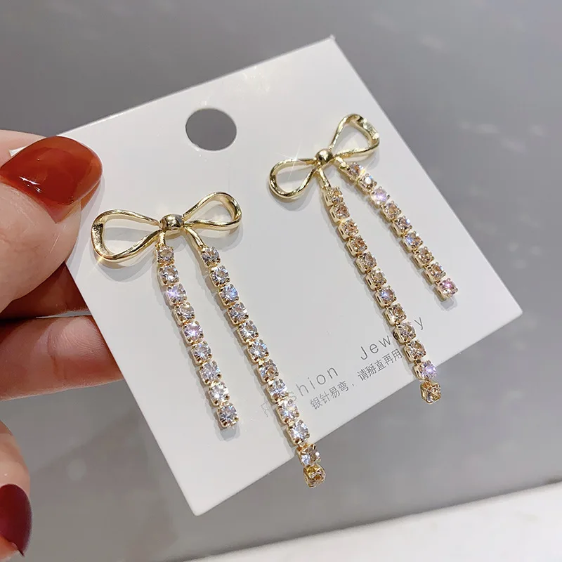 

Fashionable and exquisite temperament net red long earrings bowknot tassel crystal S925 silver needle earrings