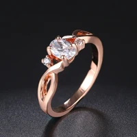 fashion spiral rose gold color ladies anniversary ring inlaid with oval shiny zircon jewelry classic wedding statement ring