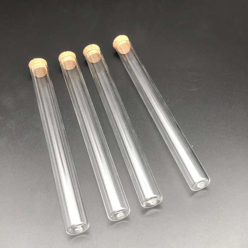 Пробирки стеклянные прозрачные с плоским дном и деревянными заглушками для