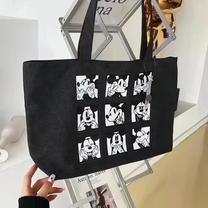 

Новая сумка Disney для девочек, черная Холщовая Сумка с принтом Микки Мауса, вместительная сумка через плечо, сумка для покупок