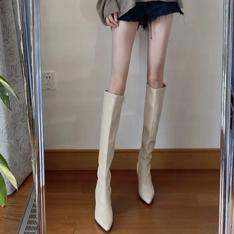 

Net red small elegant high-heeled high tube solid knight boots thin pointed toe boots stiletto elastic boots white black shoes