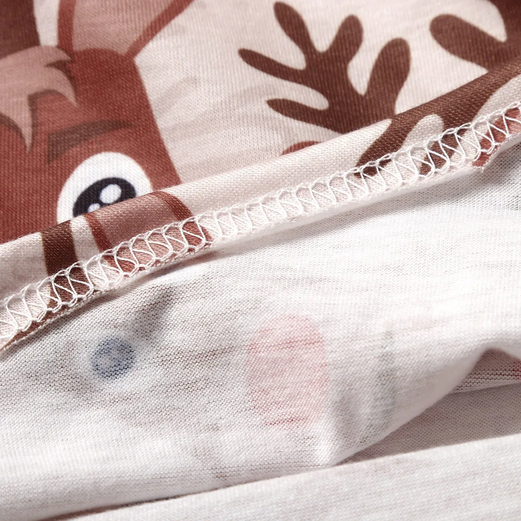 

New Christmas Flare Long Sleeve T-shirt Sexy V Neck Cross Lace Up Cartoon Elk Print Slim Xmas Tops Casual Irregular Hem Pullover