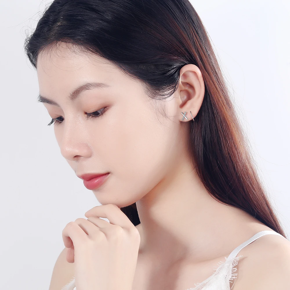 Простые серьги X-образной формы серебряного цвета с поворотным изгибом и крестом