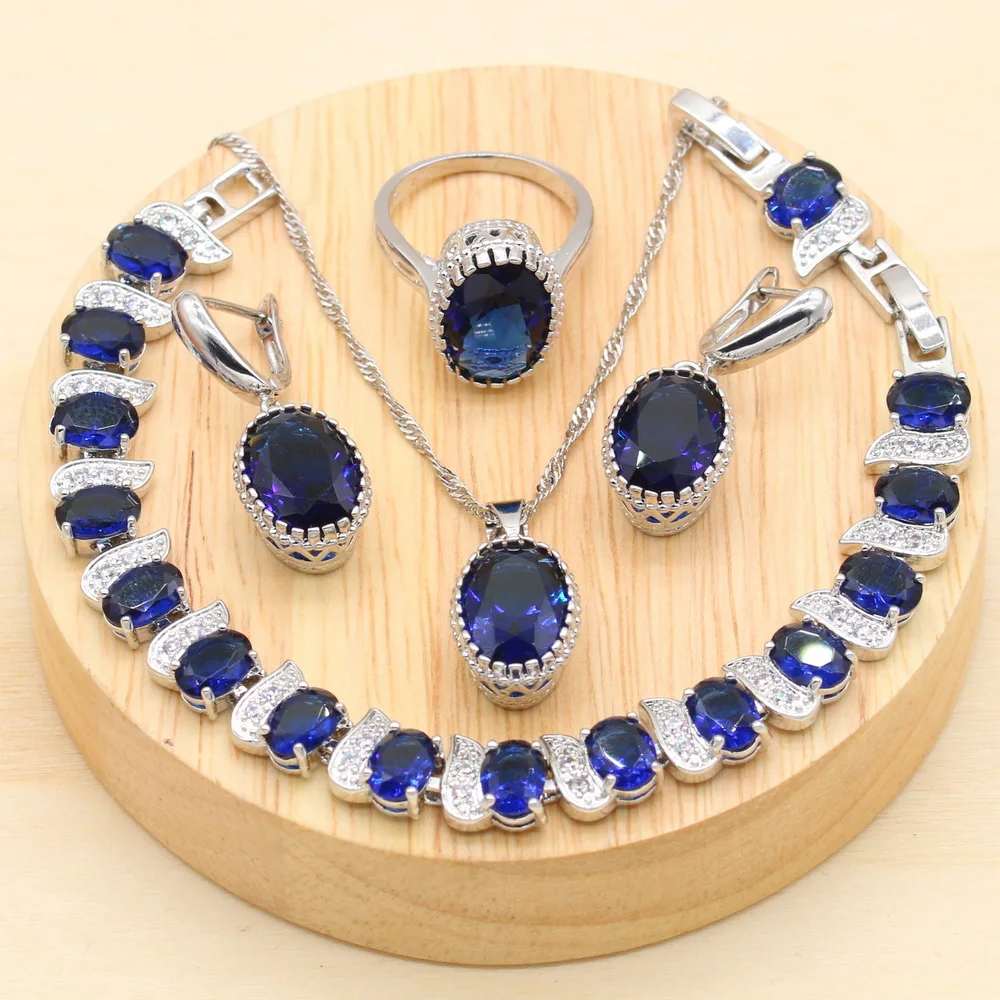 

Женский комплект из колье, серёг и браслета, из серебра 925 пробы