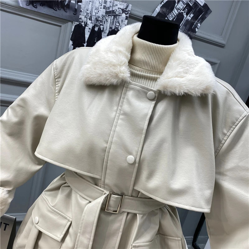 Цена 2021 Зимний новый стиль меховой отворот свободный пояс тонкий средней длины рабочие PU кожаная куртка плюс бархат толстый Модный женский