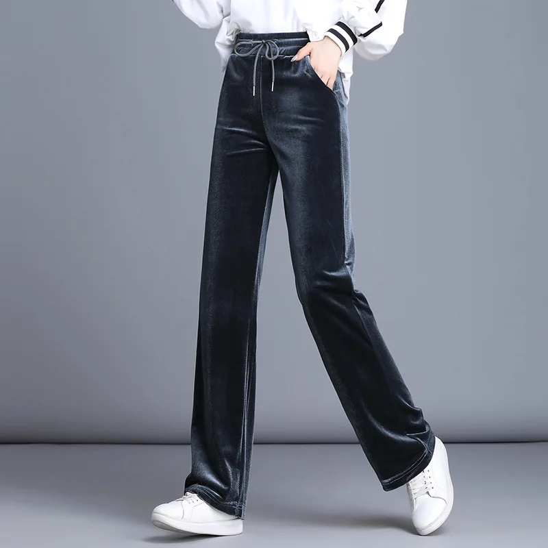 Женские утепленные флисовые брюки повседневные свободные расклешенные с