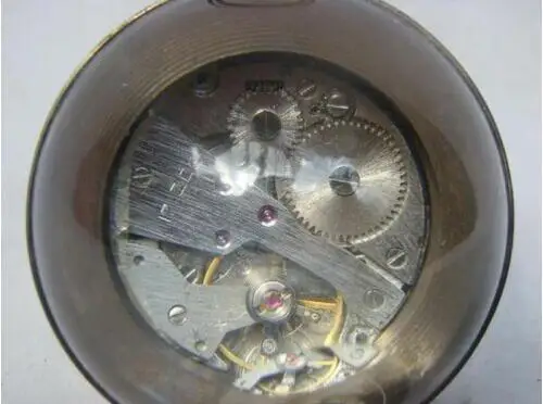 

Chinese antique brass clock round spherical glass mechanical pocket watch