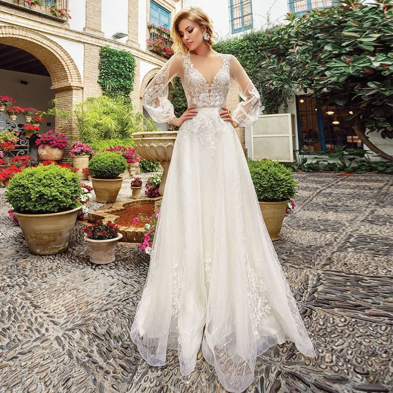 

Charming A-Line Long Sleeve Wedding Dress Sheer O-Neck Lace Applique Boho Tulle Bridal Gown Illusion Backless Button Sweep Train