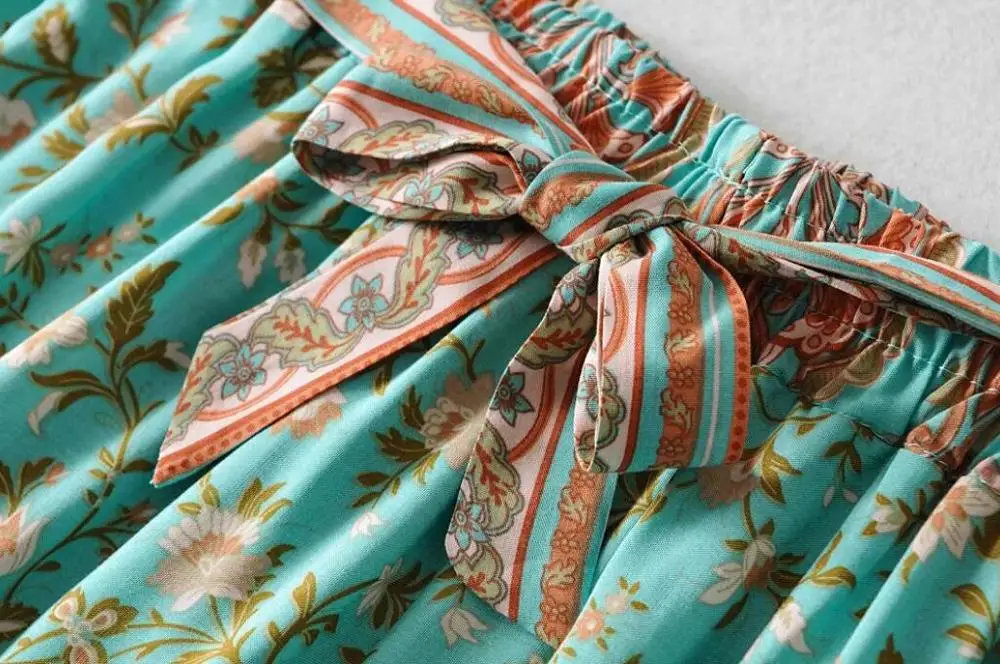 

New elastic upper and lower hem printed bra vest sexy belt wide leg pants 2-piece set