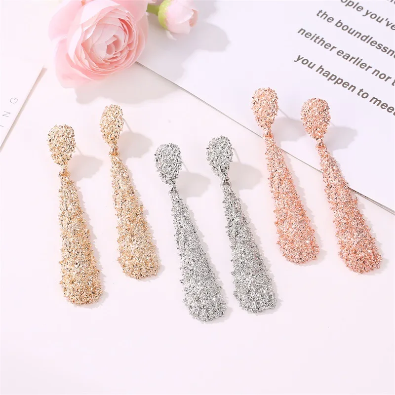 

Exaggerated Metal Frosted Long Stud Earrings Frosty Wind Drop-Shaped Relief Long Earrings