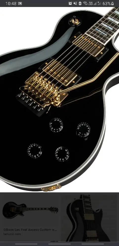 

Custom high-quality electric guitars, black, gold hardware, guitars and suitcases.