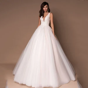 Tulle Deep V-Neck Sleeveless Princess Wedding Dresses 2022 Puffy Beads Appliques Bridal Dresses Ball