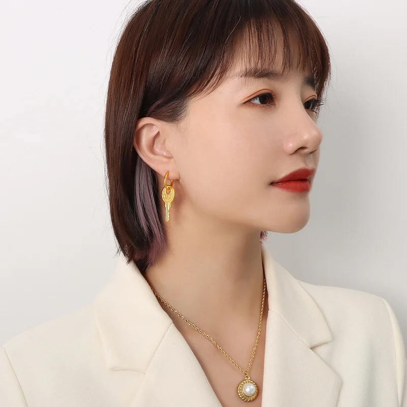 ALLNEWME Exaggerated Gold Colour Lock Key Asymmetric Pendant Earrings for Women Ladies Titanium Steel Earrings Accessories