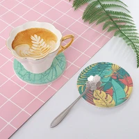 heat insulating water absorbing and quick drying round diatomite coaster simple green leaf diatom mud coaster heat resistant